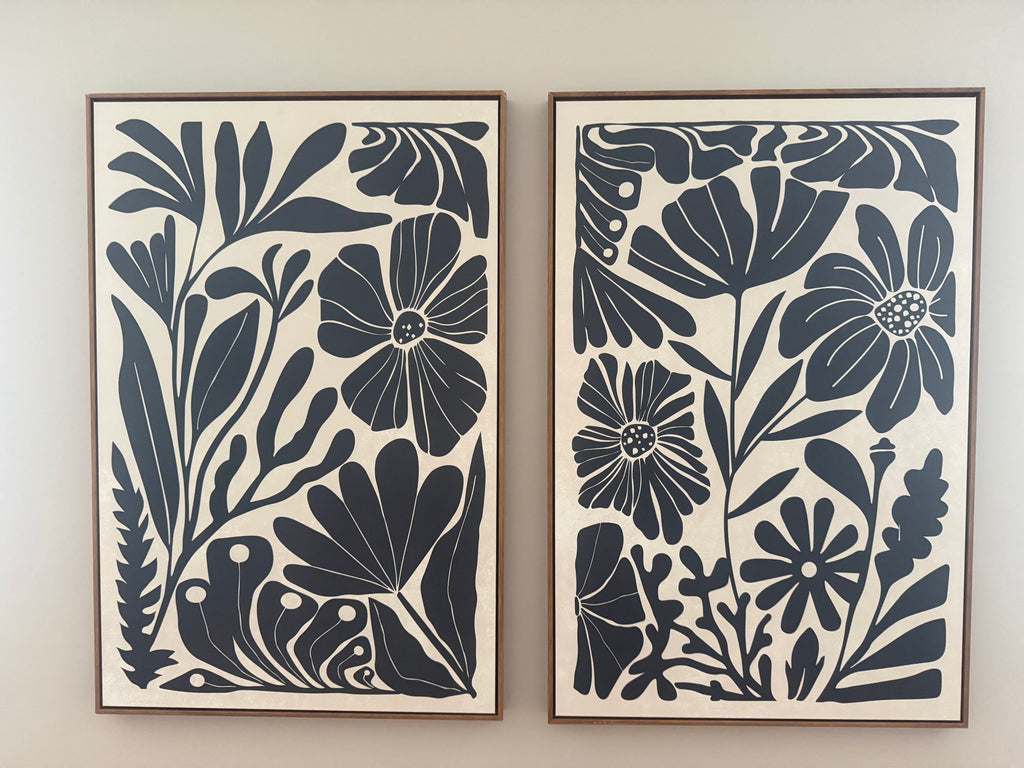 Set of black and ivory art with wooden frame rental