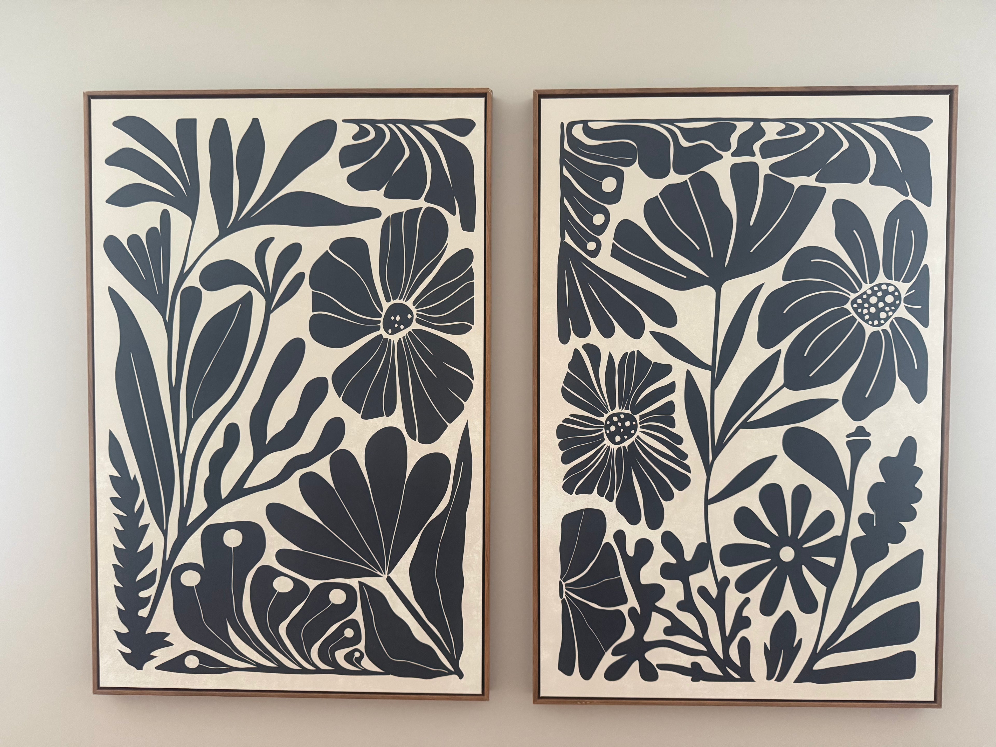 Set of black and ivory art with wooden frame rental