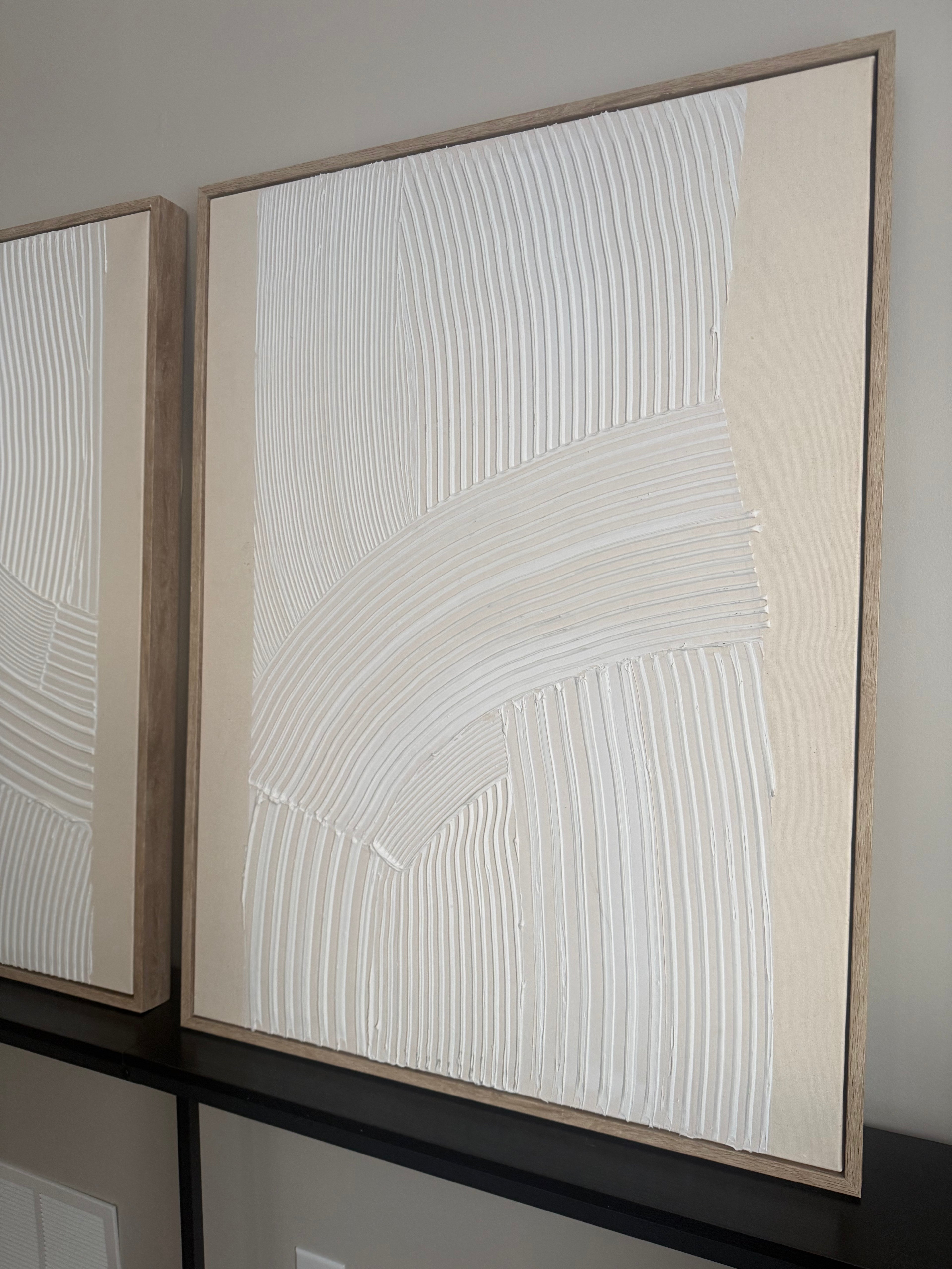 Set of 2 large neutral plaster wall decor rental