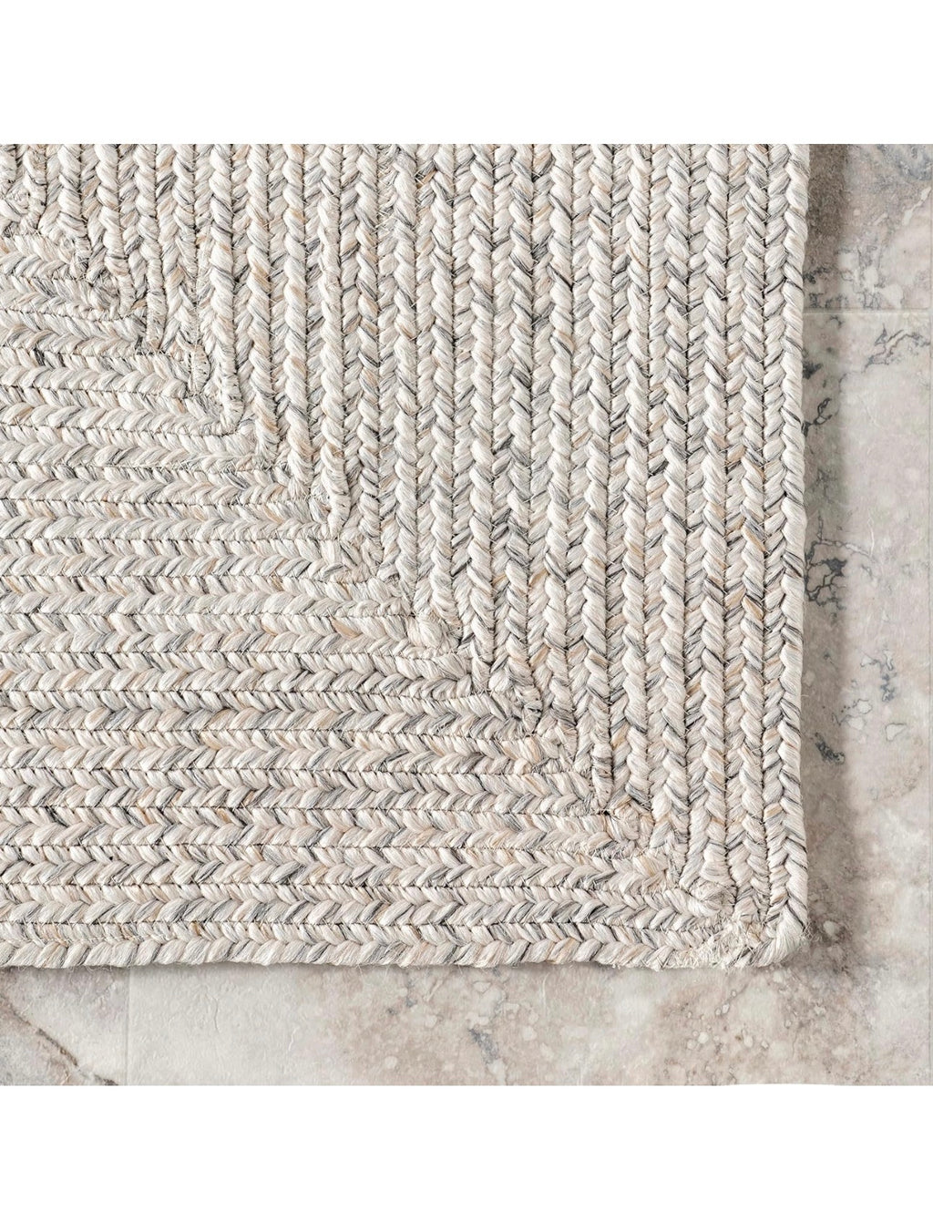 Oval braided white/ neutral 9x12’ jute rug rental