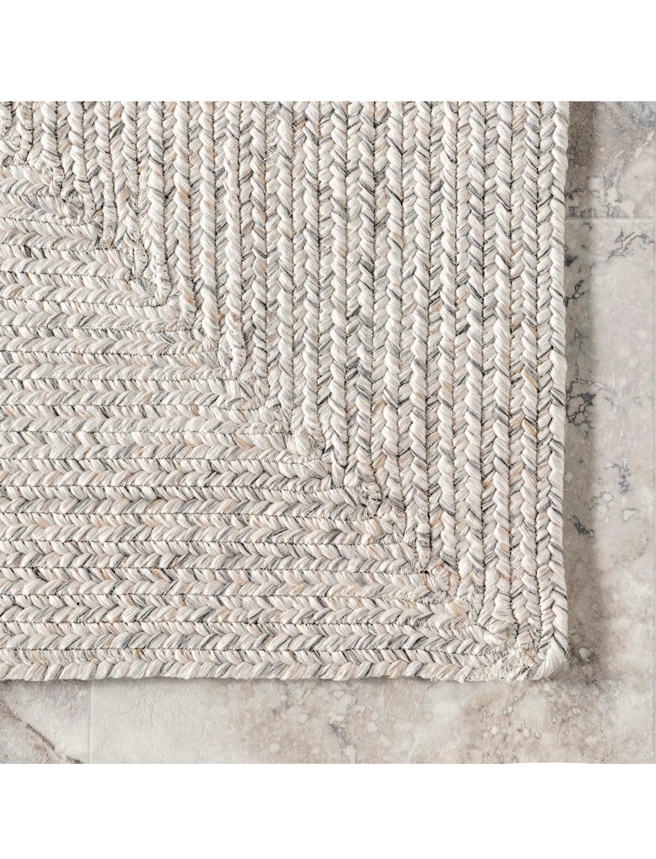 Oval braided white/ neutral 9x12’ jute rug rental