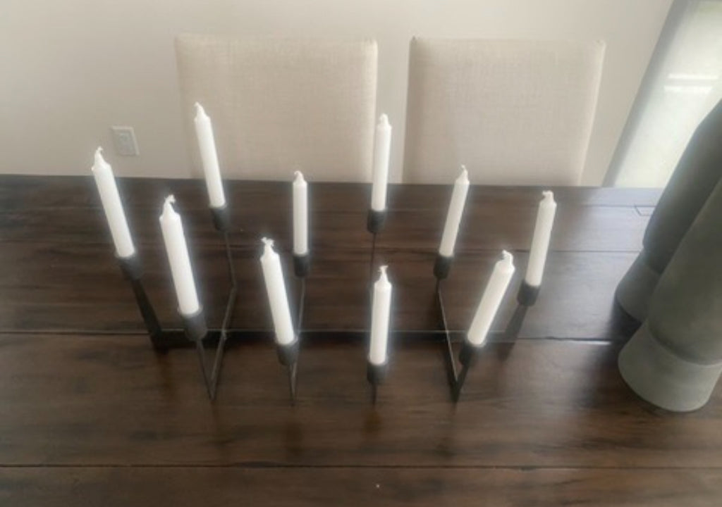 Black iron candelabra centrepiece rental
