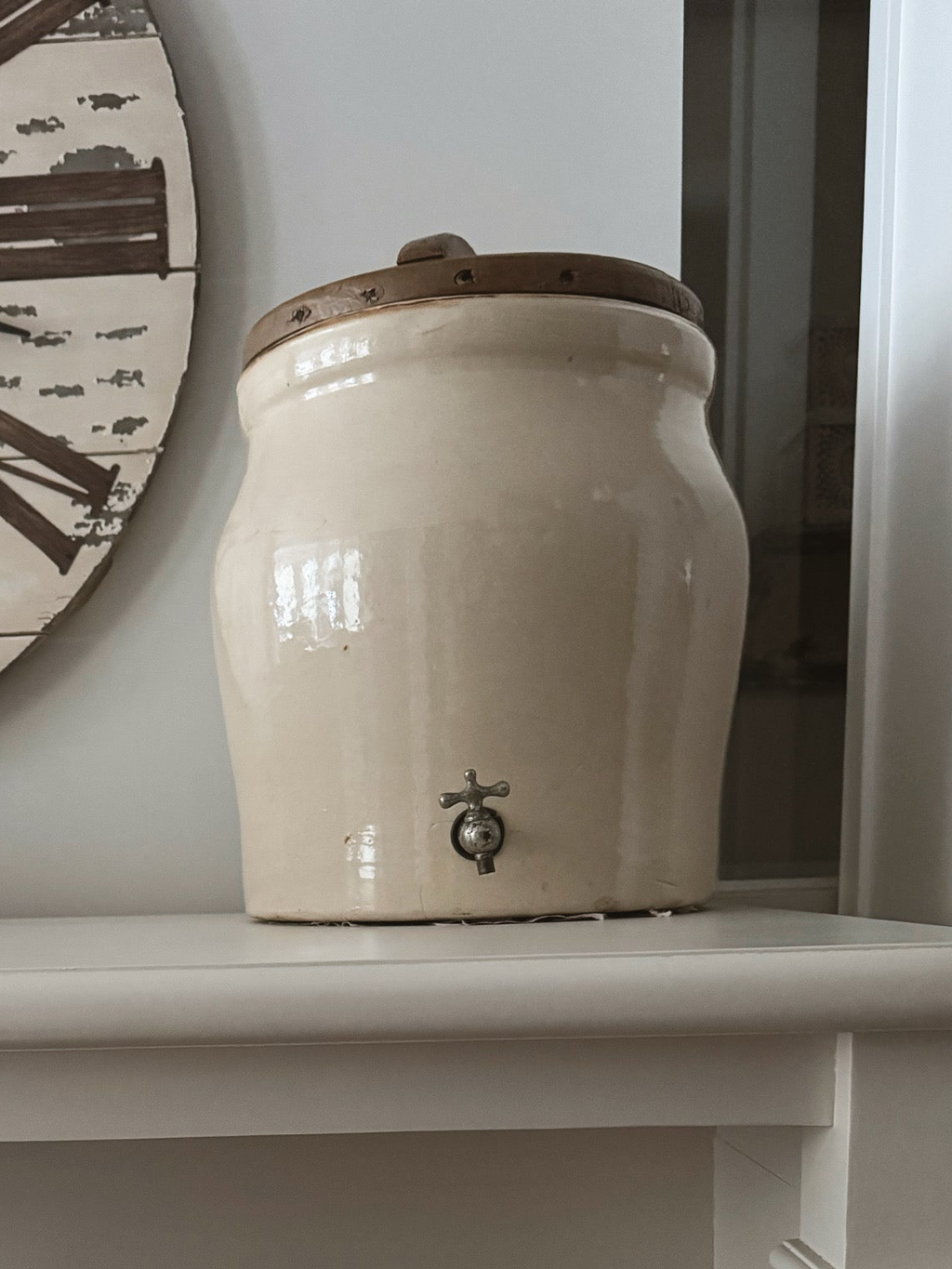 Antique water crock jug dispenser