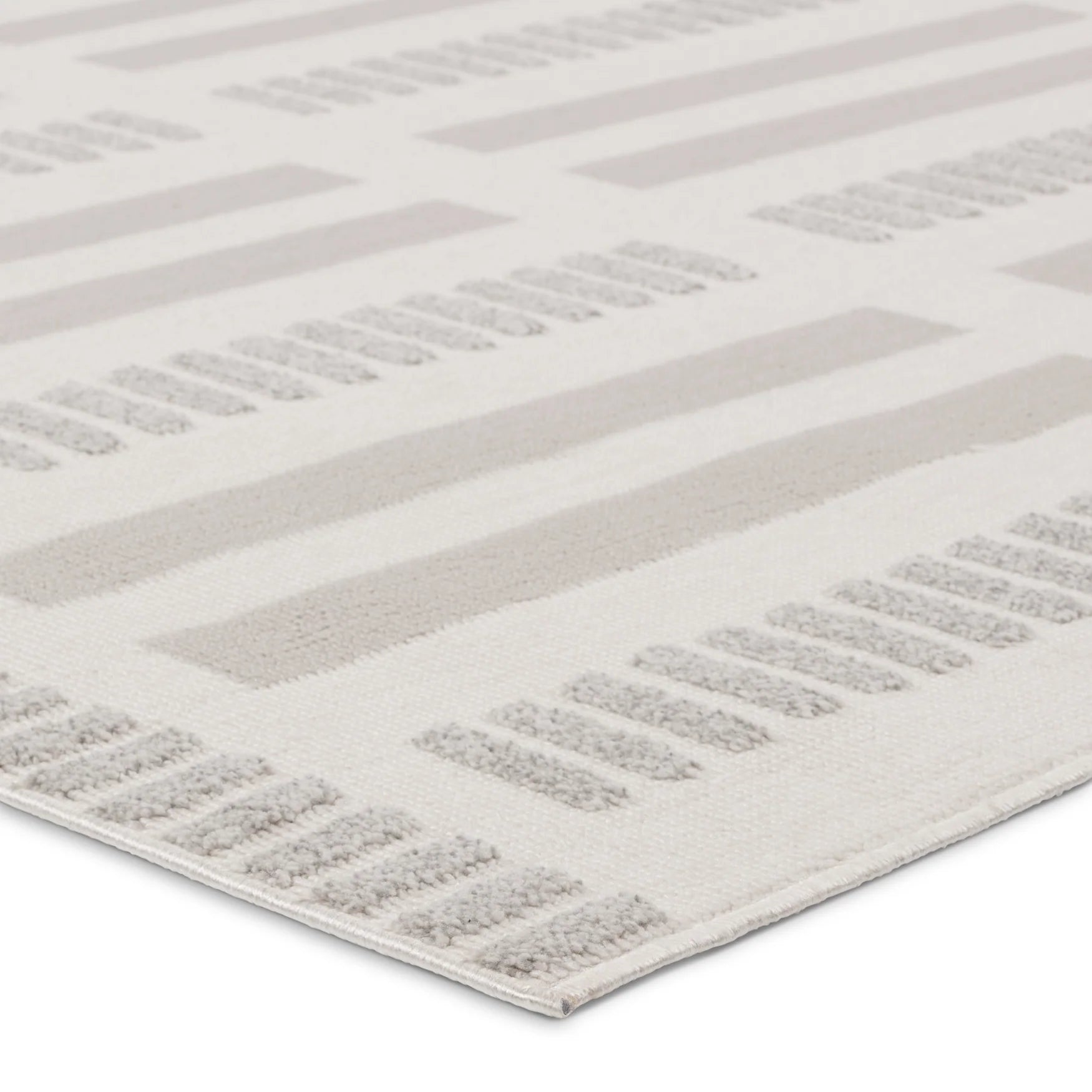 5’3” x 7’6” white , taupe and grey rug rental