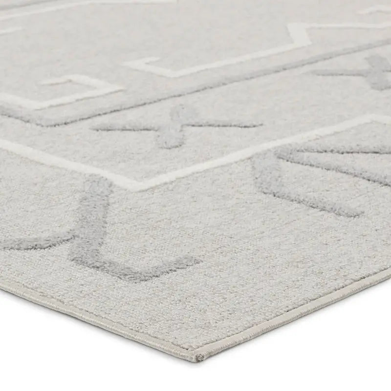 6’7x9’6” grey and white patterned rug