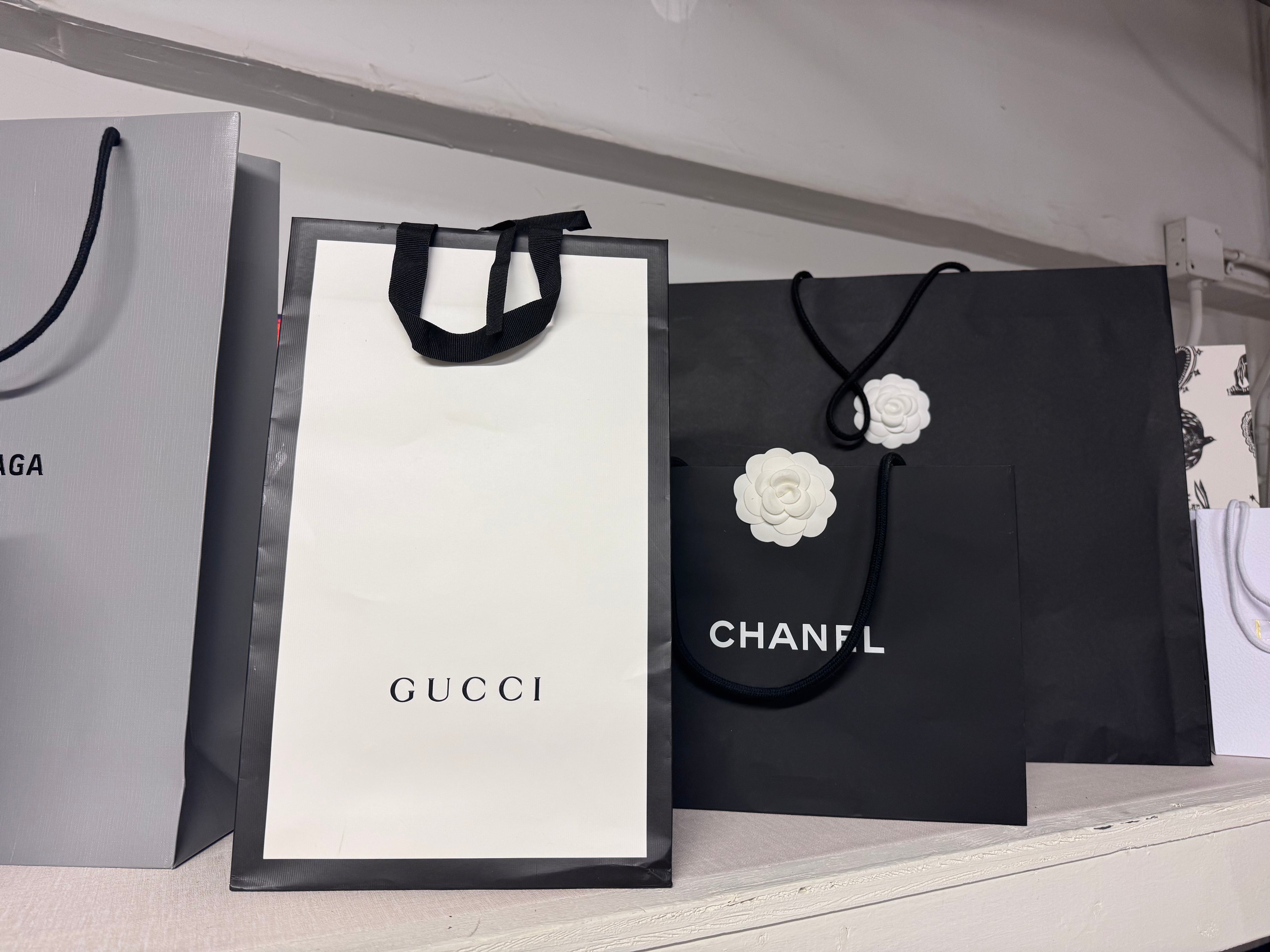 Designer bags and boxes for closet styling rental