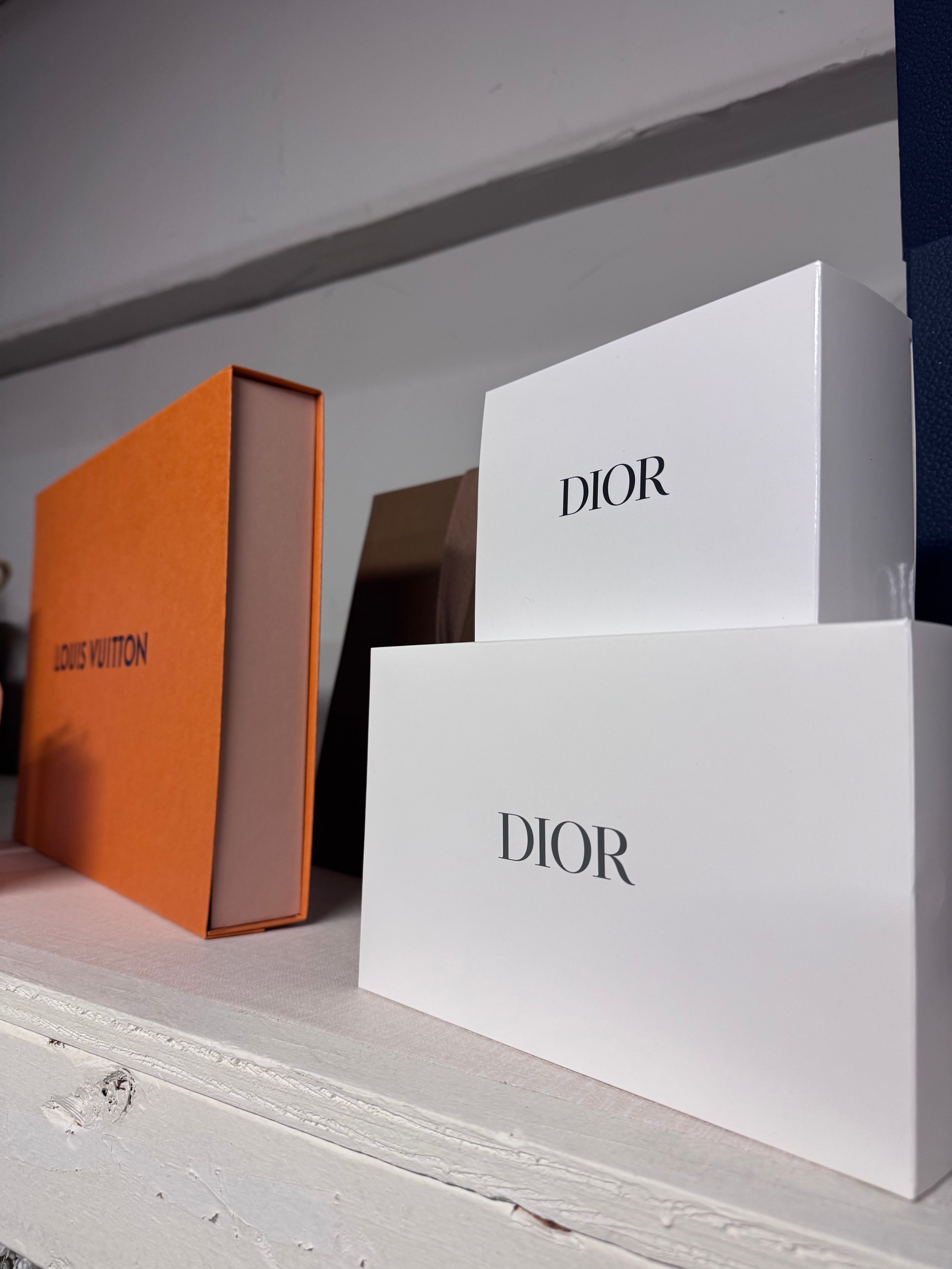 Designer bags and boxes for closet styling rental