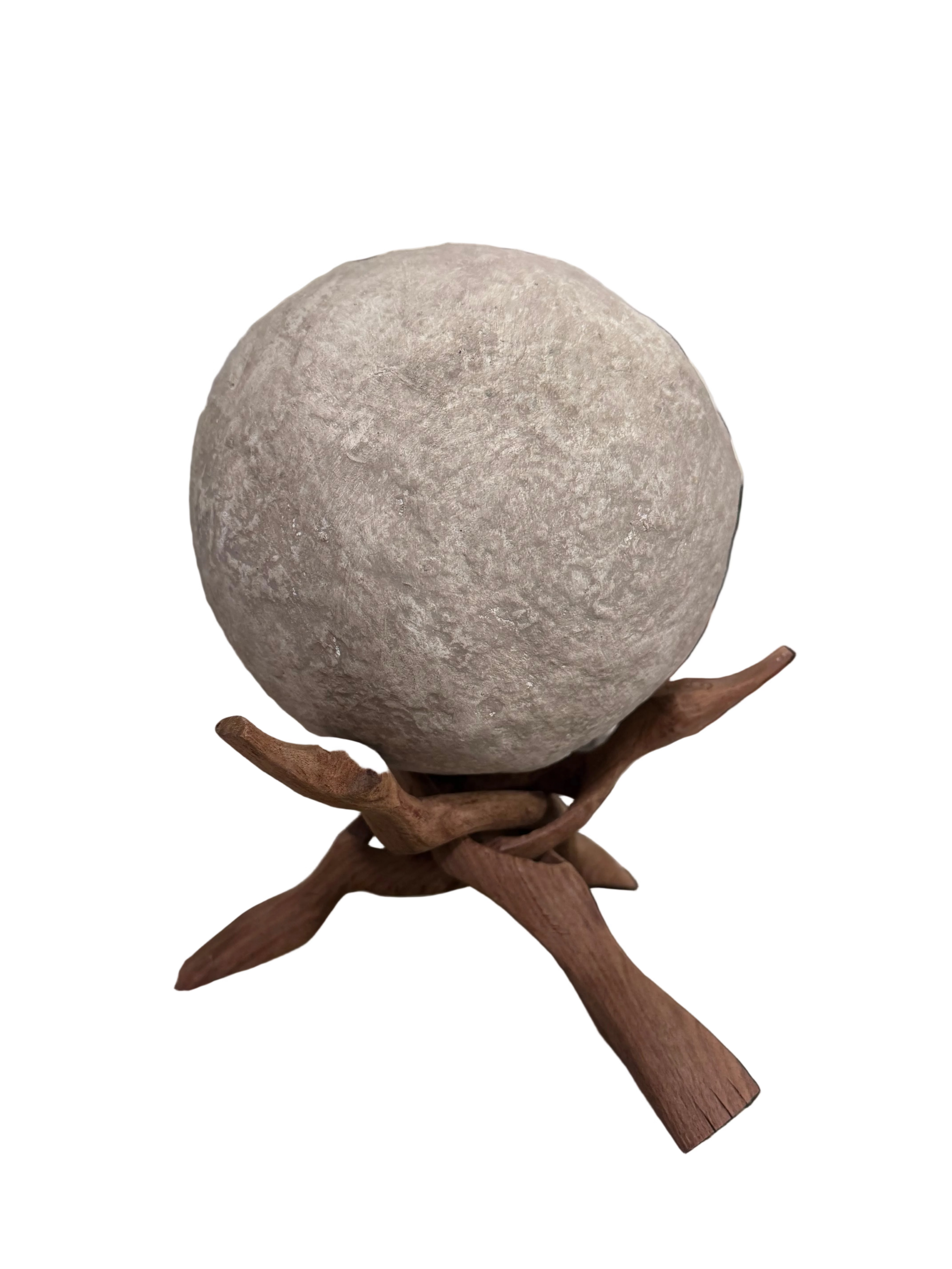 Papier mache sphere on a tripod rental