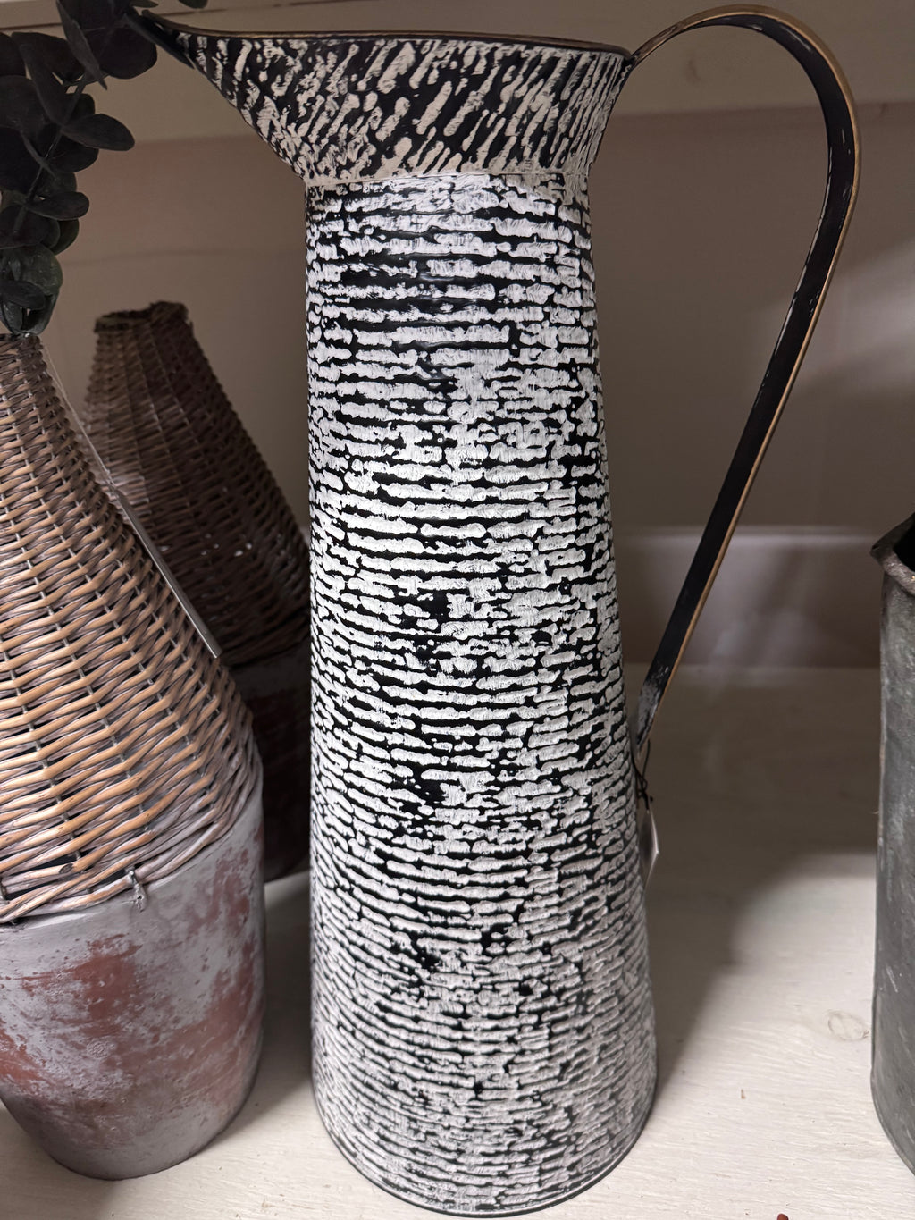Tall Black and white metal jug rental